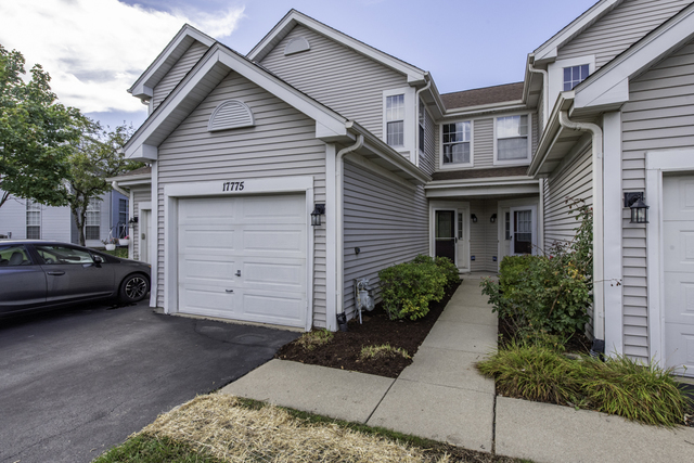 a view of a house with a garden