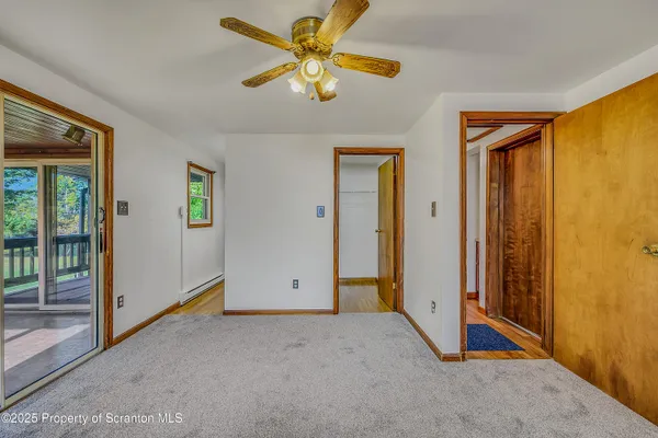 a view of empty room with windows