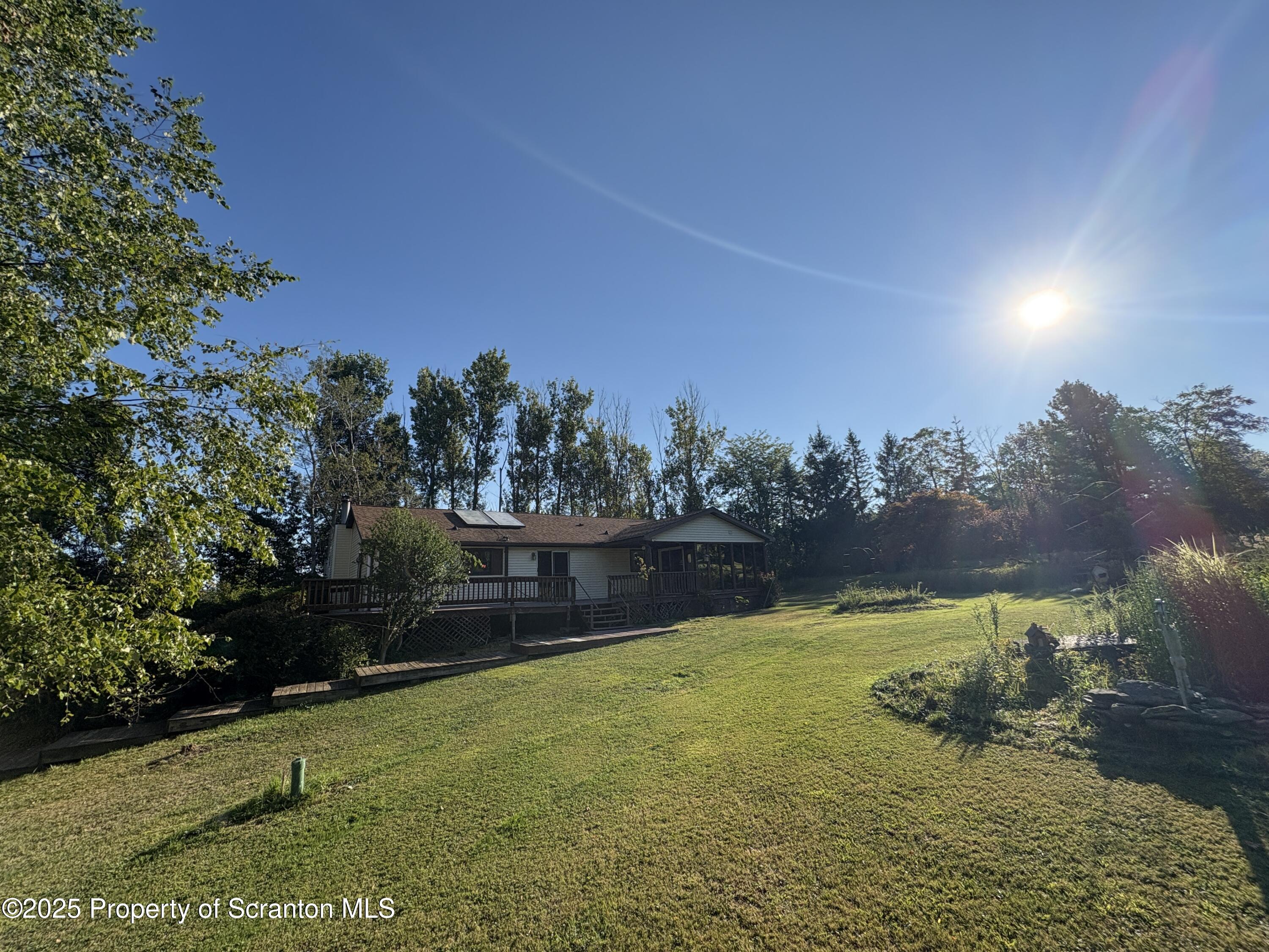 9119 Valley View Drive Clarks Summit, PA 18411 - Photo 24 of 78 a view of a lake