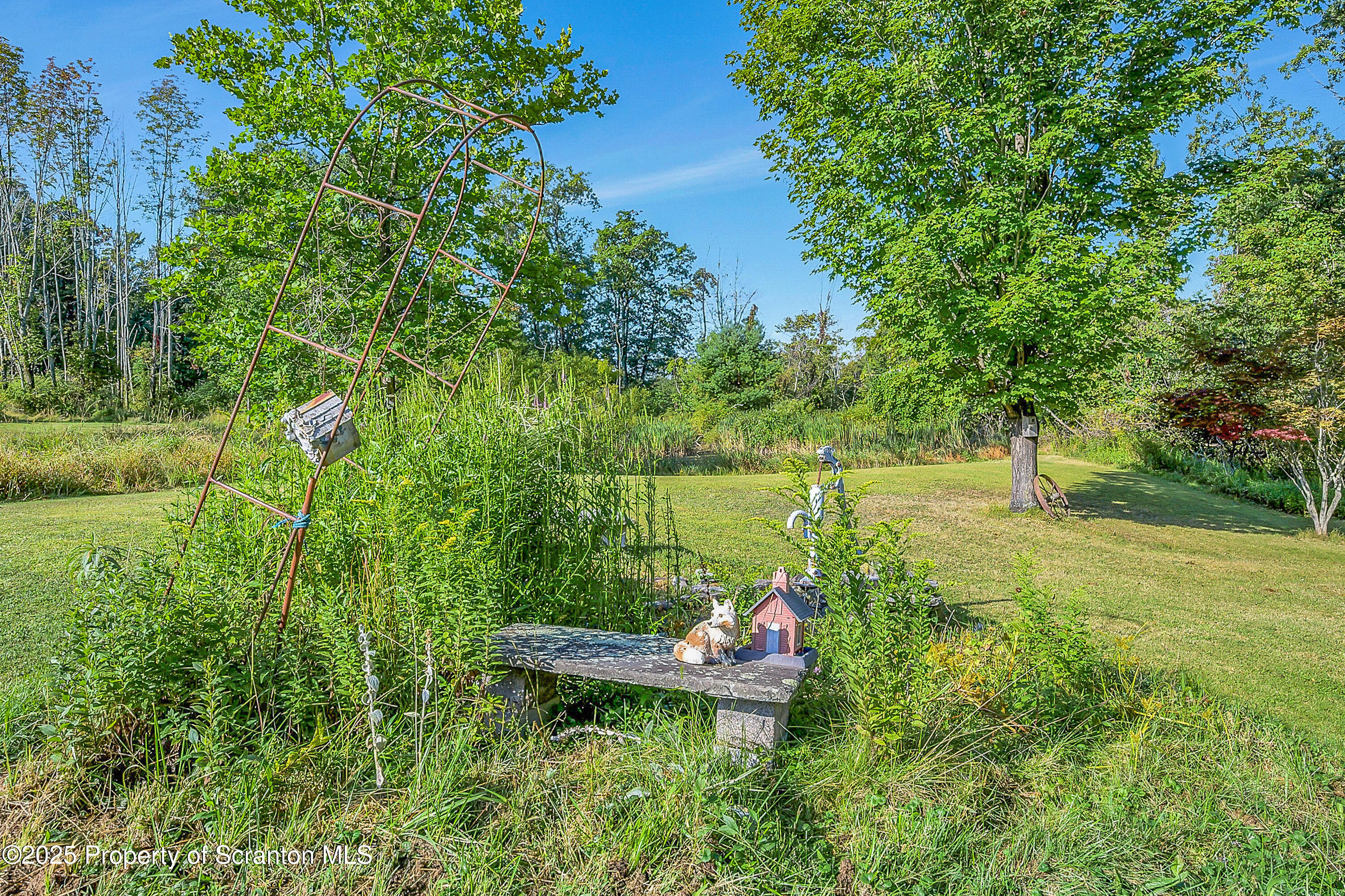 9119 Valley View Drive Clarks Summit, PA 18411 - Photo 76 of 78 a garden view with a lake view