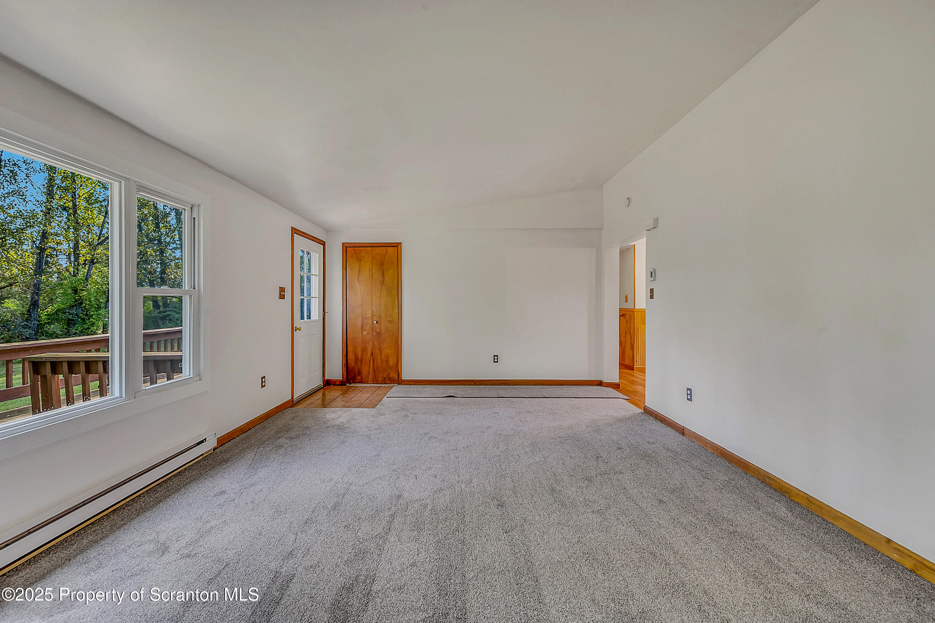 9119 Valley View Drive Clarks Summit, PA 18411 - Photo 10 of 78 a view of an empty room with a window