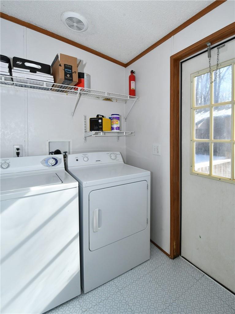 1524-l R L R Schronce Lane Iron Station, NC 28080 - Photo 11 of 32 a utility room with dryer and washer