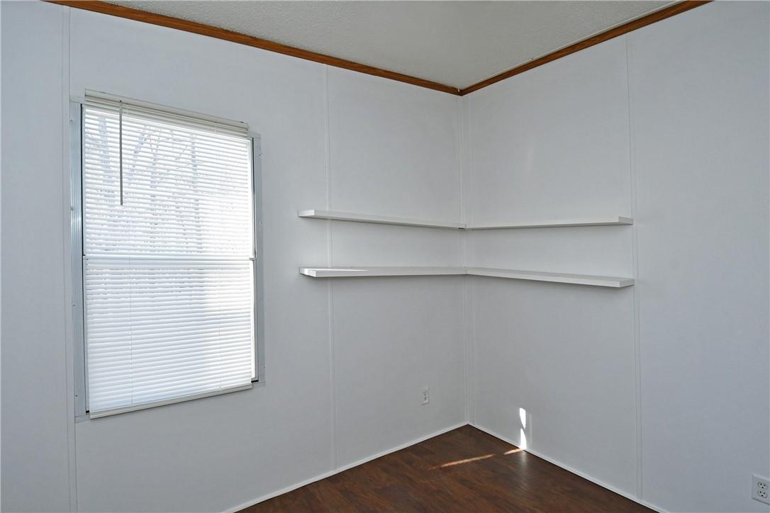 1524-l R L R Schronce Lane Iron Station, NC 28080 - Photo 14 of 32 a view of a small space with wooden floor and a window