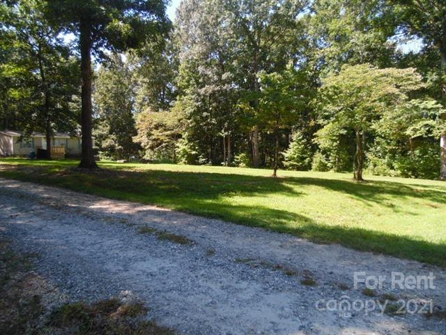 1524-l R L R Schronce Lane Iron Station, NC 28080 - Photo 2 of 32 a view of outdoor space with trees all around