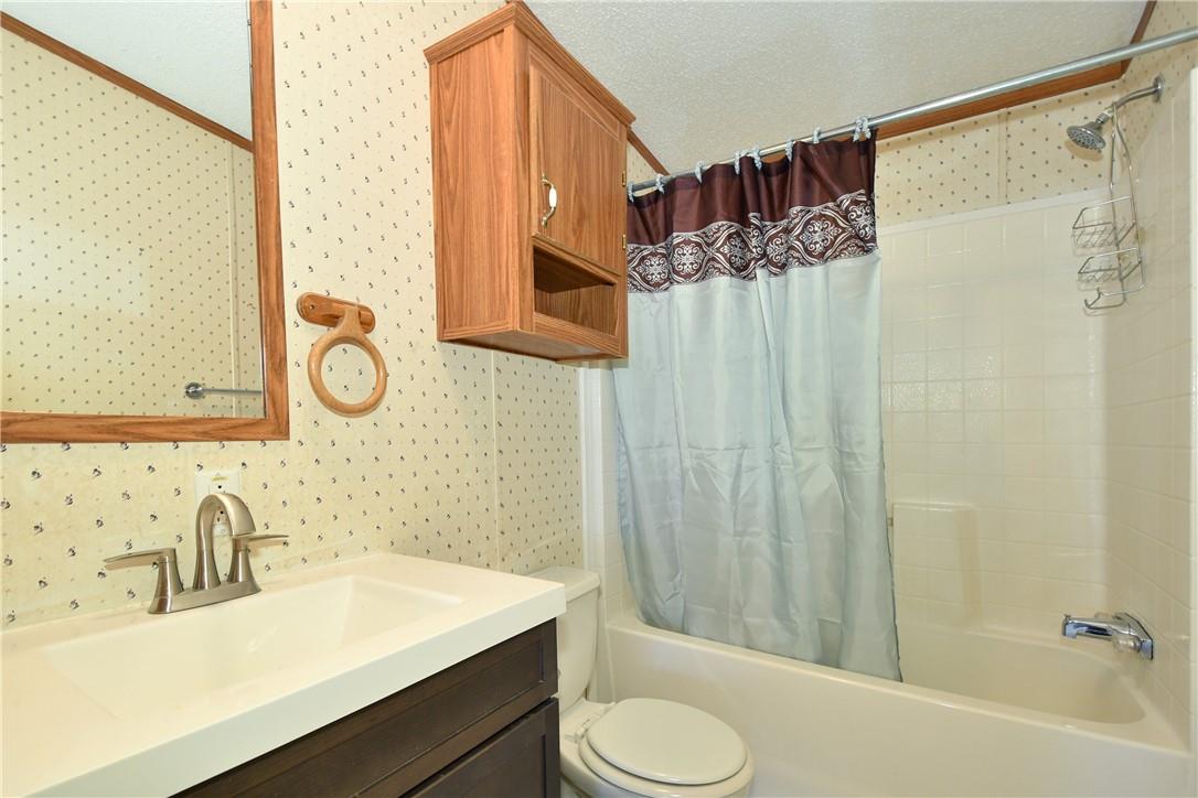 1524-l R L R Schronce Lane Iron Station, NC 28080 - Photo 21 of 32 a bathroom with a sink a toilet and shower