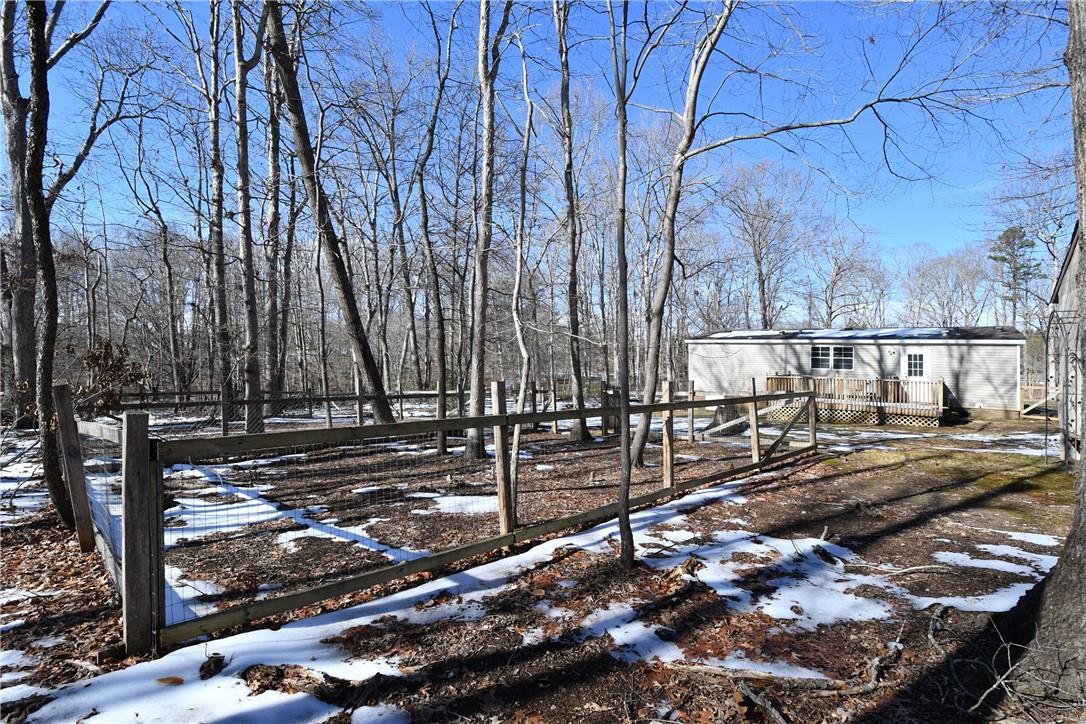 1524-l R L R Schronce Lane Iron Station, NC 28080 - Photo 30 of 32 a view of a yard with wooden fence