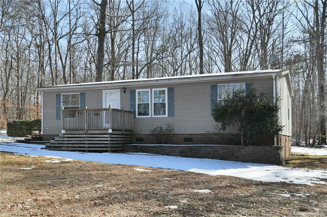 1524-l R L R Schronce Lane Iron Station, NC 28080 - Photo 4 of 32 a front view of a house with a yard