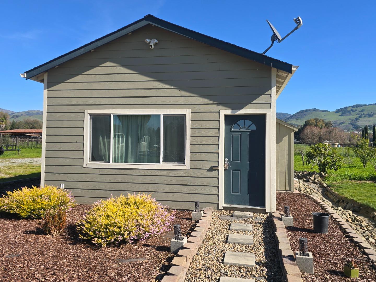 2015 Trumar Lane Gilroy, CA 95020 - Photo 27 of 30 a front view of a house with a yard