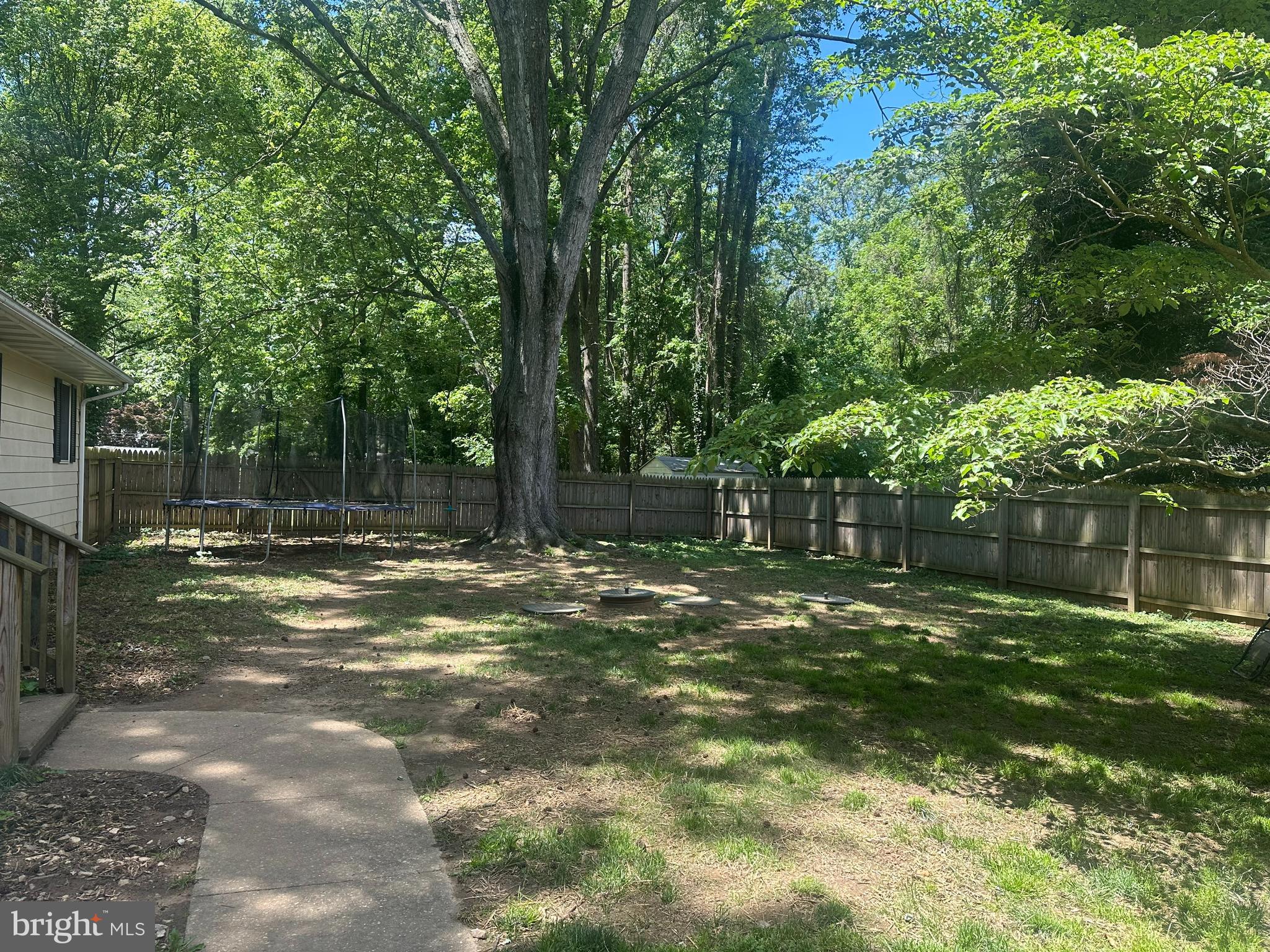 109 Wilton Road Chestertown, MD 21620 - Photo 22 of 31 a backyard of a house with lots of green space