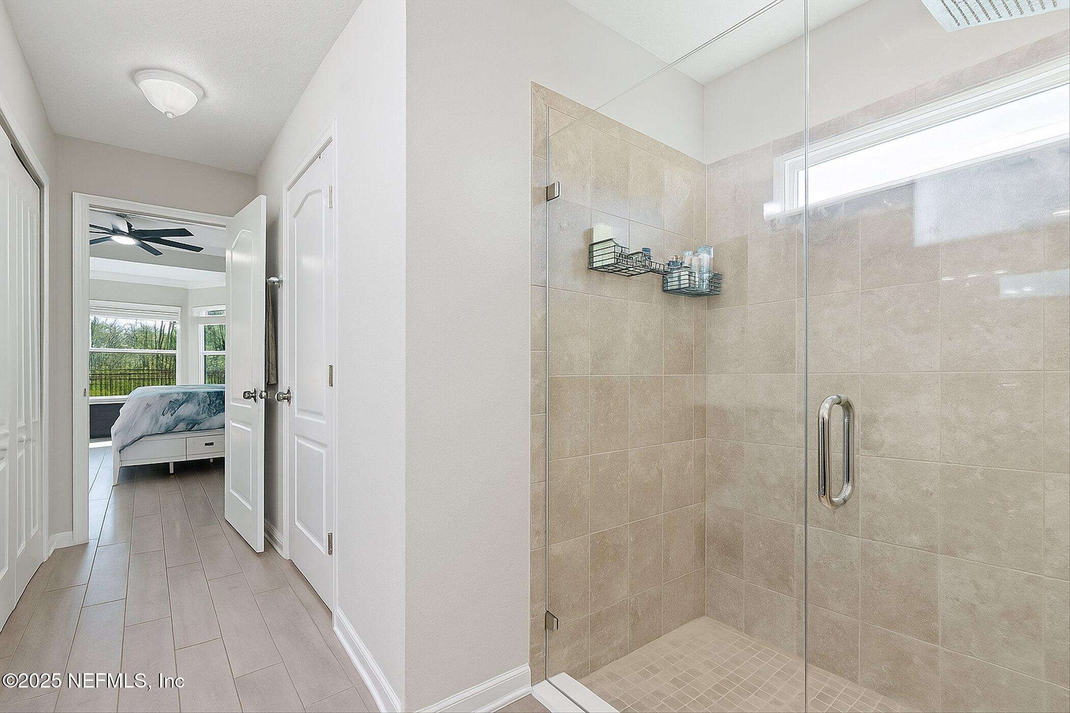 49 Sunberry Way St. Augustine, FL 32092 - Photo 15 of 30 a en suite bathroom with a shower
