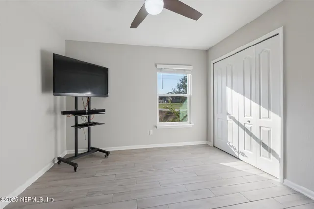 a view of livingroom with hardwood floor and window