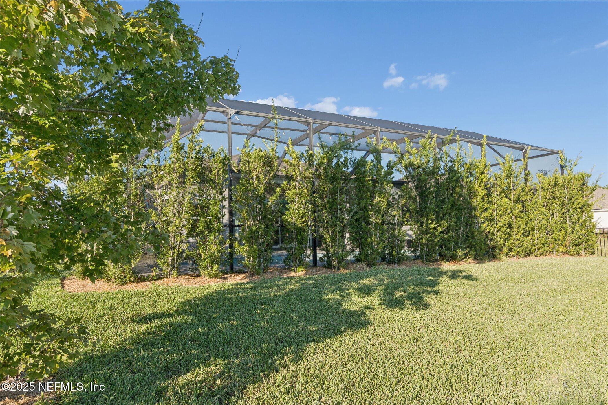 49 Sunberry Way St. Augustine, FL 32092 - Photo 29 of 30 a view of outdoor space with deck and yard