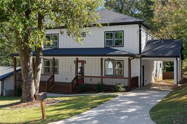front view of a house with a yard