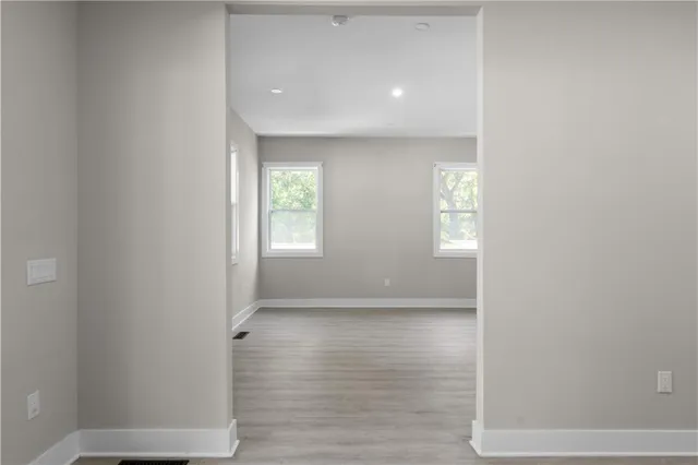 a kitchen with stainless steel appliances granite countertop a sink and stove