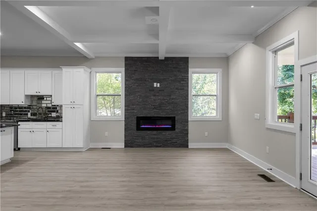 a bathroom with a toilet a sink and bathtub