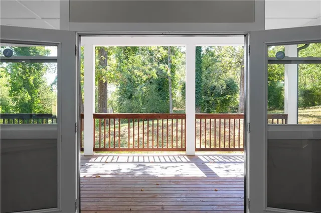a bathroom with a double vanity sink toilet and shower