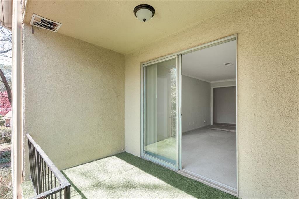 2390 Lawrenceville Highway, Unit K Decatur, GA 30033 - Photo 22 of 22 a view of a hallway to rooms