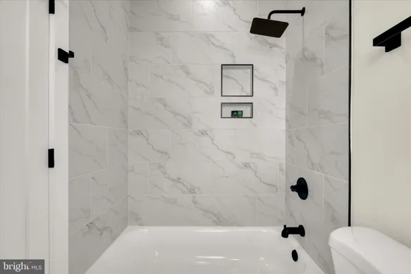 a bathroom with a bathtub