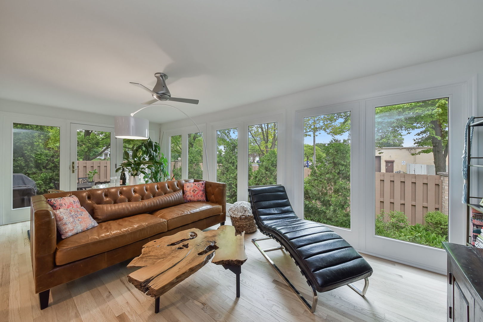 704 Natwill Square Geneva, IL 60134 - Photo 12 of 35 a living room with furniture and a large window