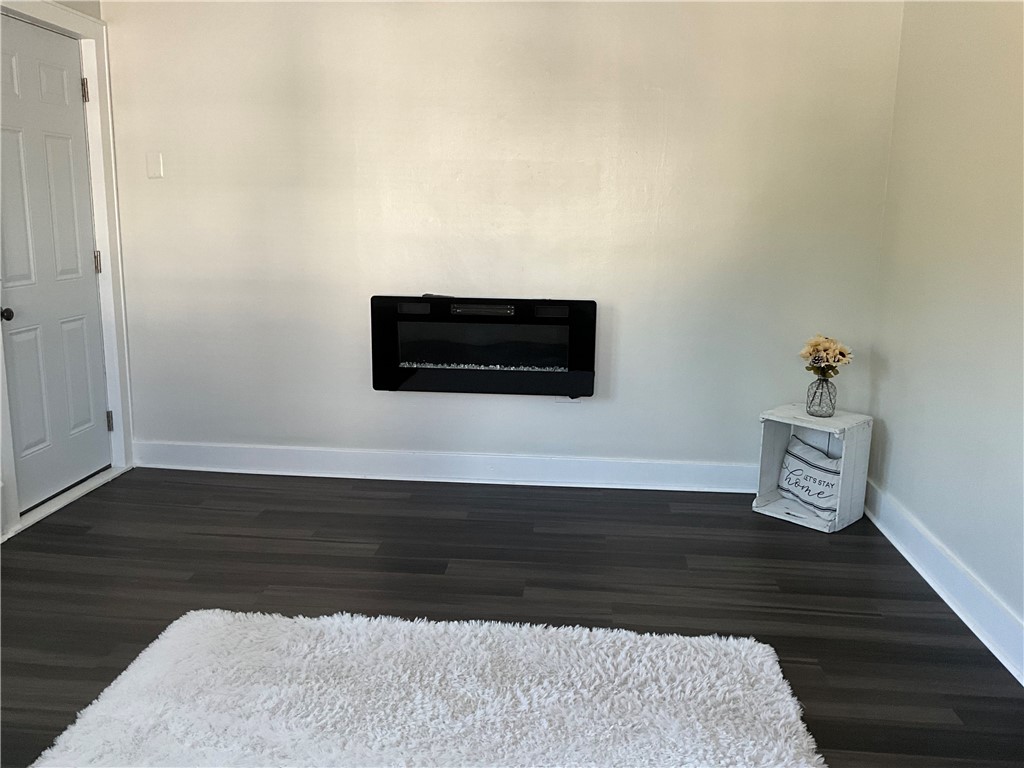 11752 Highway 90 Locke, NY 13092 - Photo 16 of 43 Living room fireplace