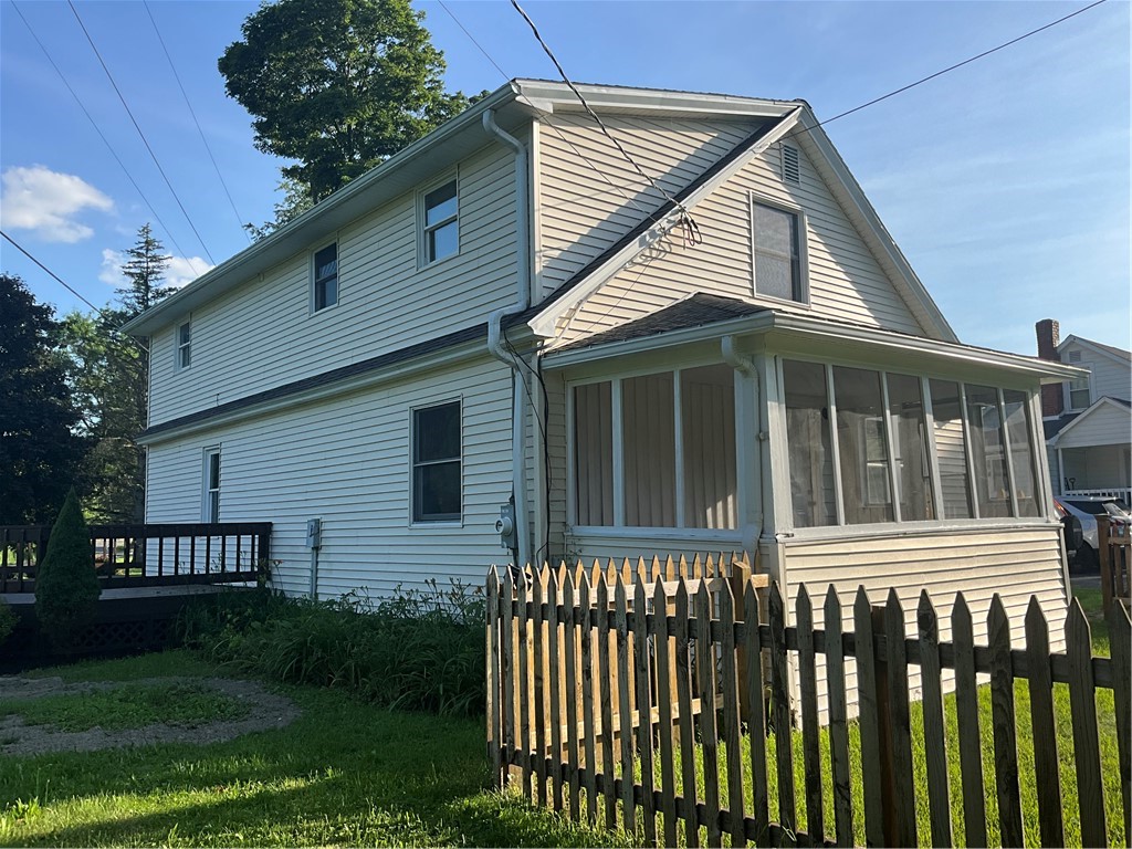 11752 Highway 90 Locke, NY 13092 - Photo 6 of 43 Fenced in yard off the screened in front porch