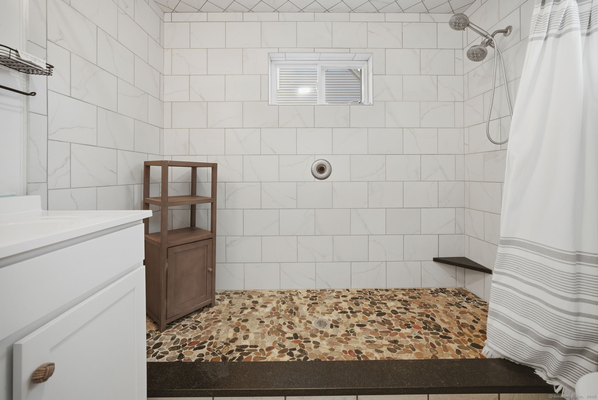 136 Sandy Beach Road Goshen, CT 06756 - Photo 20 of 26 a bathroom with a shower