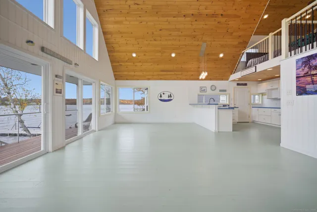 a view of a kitchen with appliances and cabinets