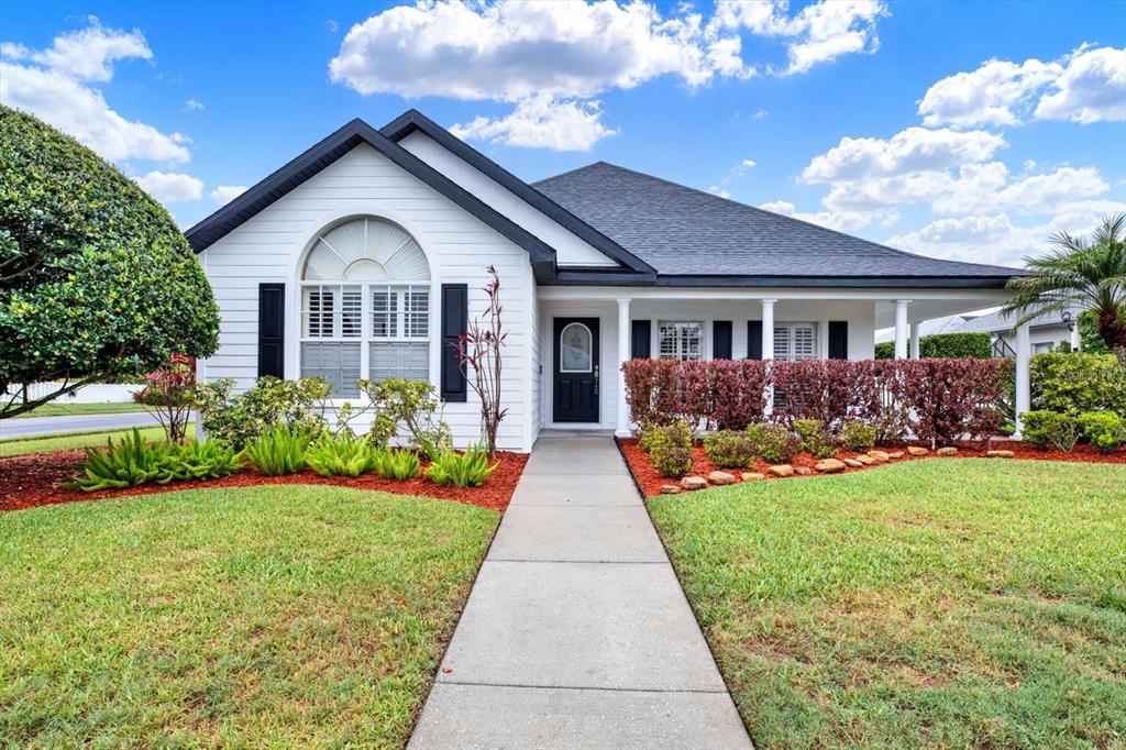 2021 Meadow Rue Court Trinity, FL 34655 - Photo 1 of 41 a front view of a house with garden