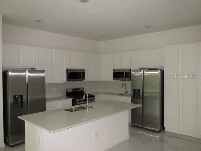 1275 Butterfly Orchid Road Davenport, FL 33837 - Photo 5 of 43