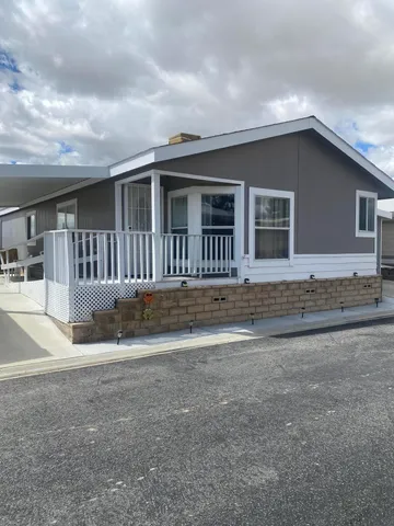 a house view with a backyard space