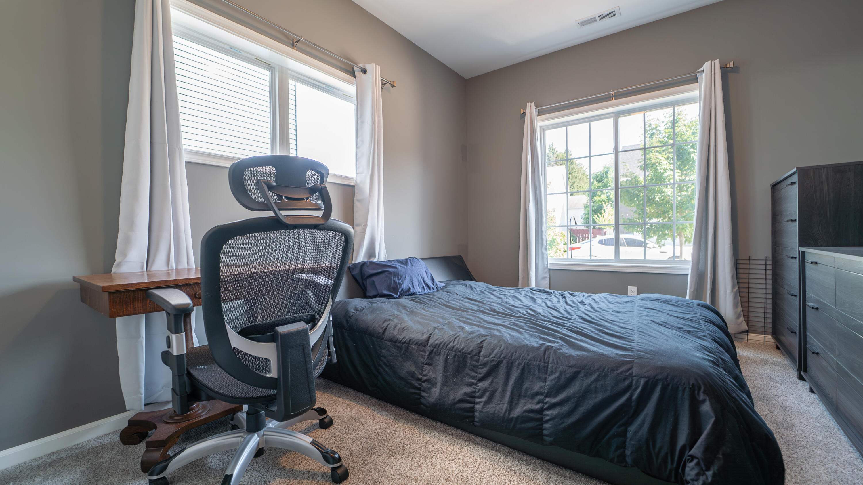 538 Emerald Drive Chesterton, IN 46304 - Photo 18 of 25 a bedroom with a bed and a window