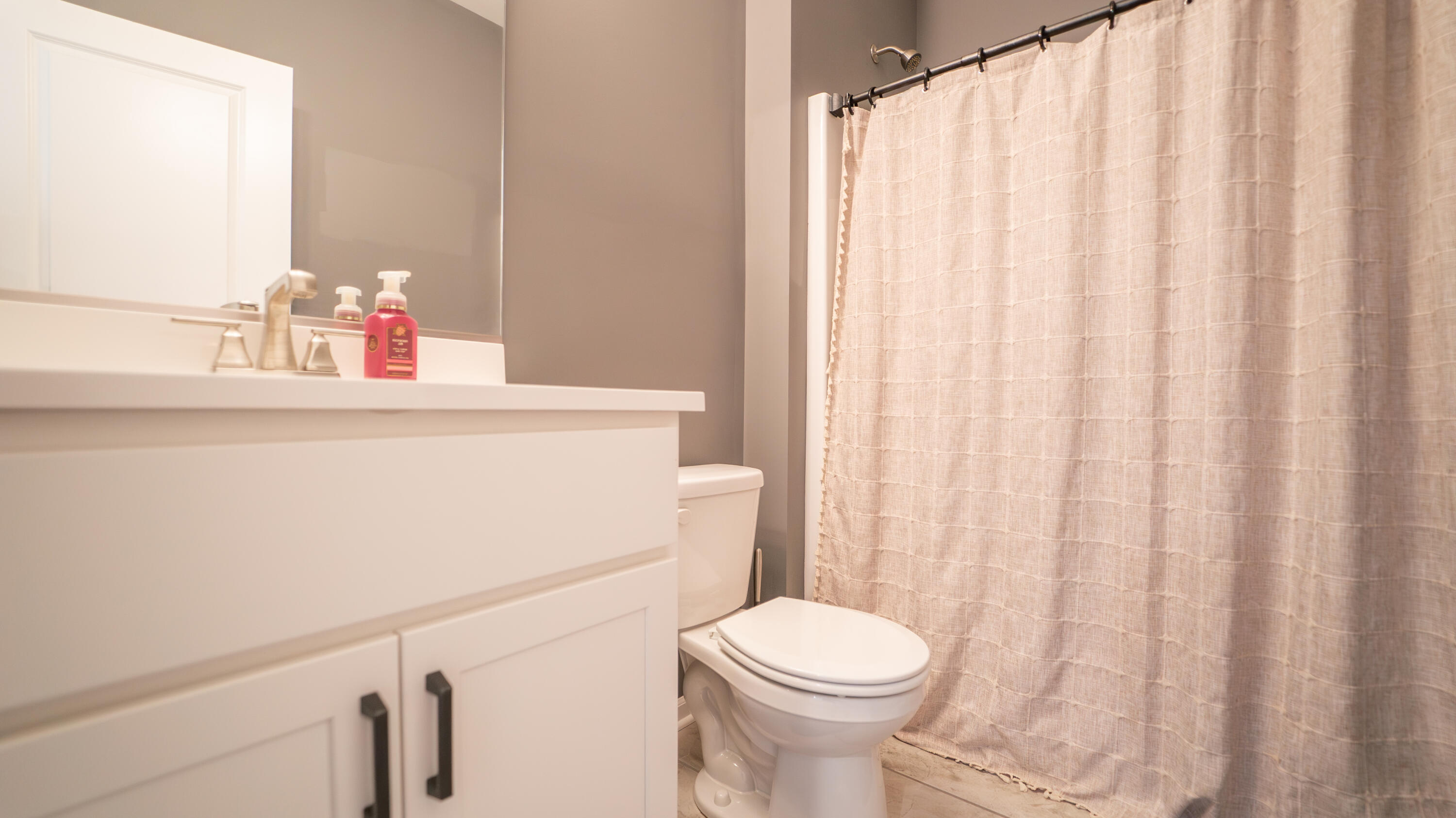 538 Emerald Drive Chesterton, IN 46304 - Photo 19 of 25 a bathroom with a sink and a toilet