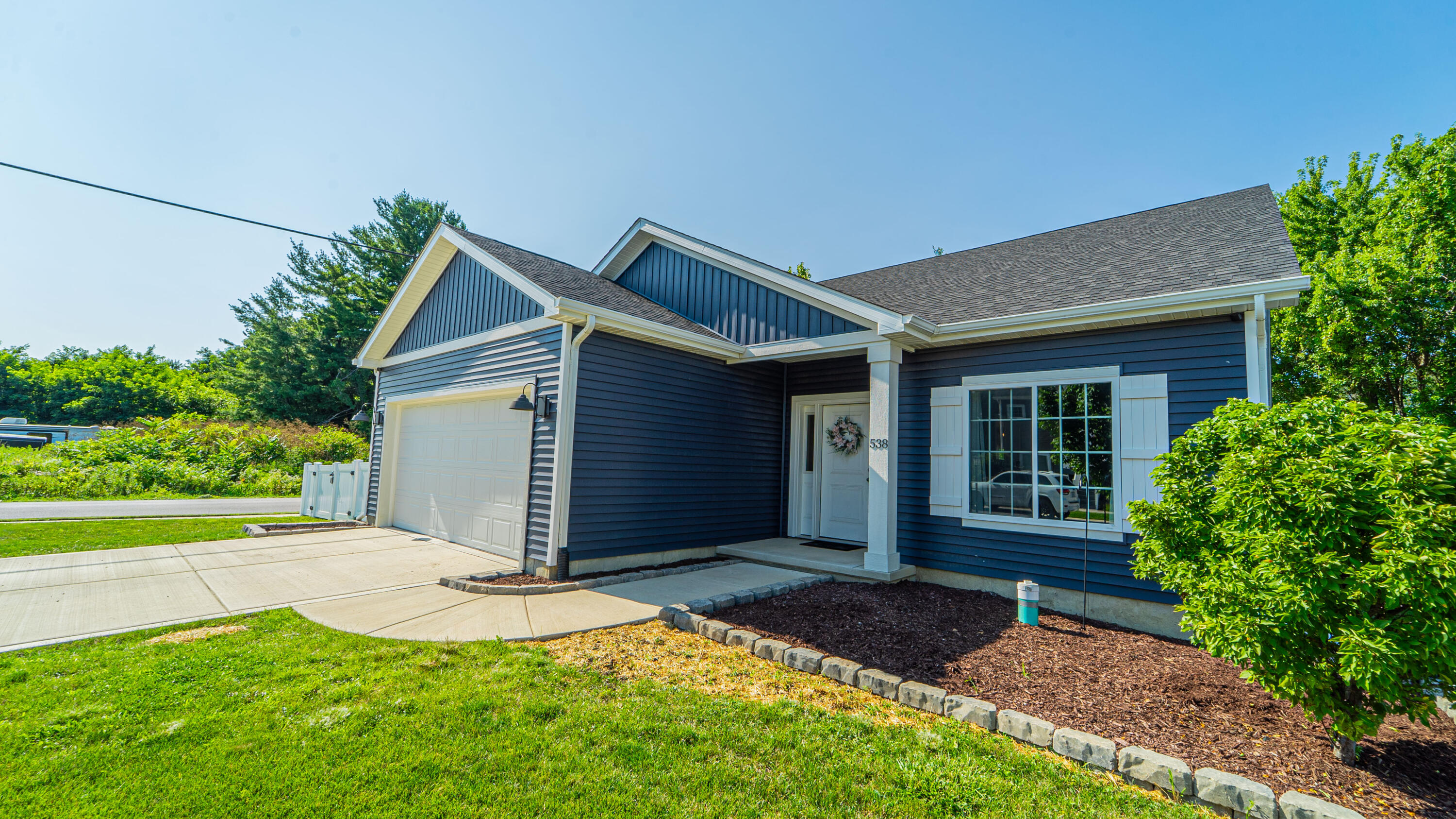 538 Emerald Drive Chesterton, IN 46304 - Photo 3 of 25 a front view of a house with a yard