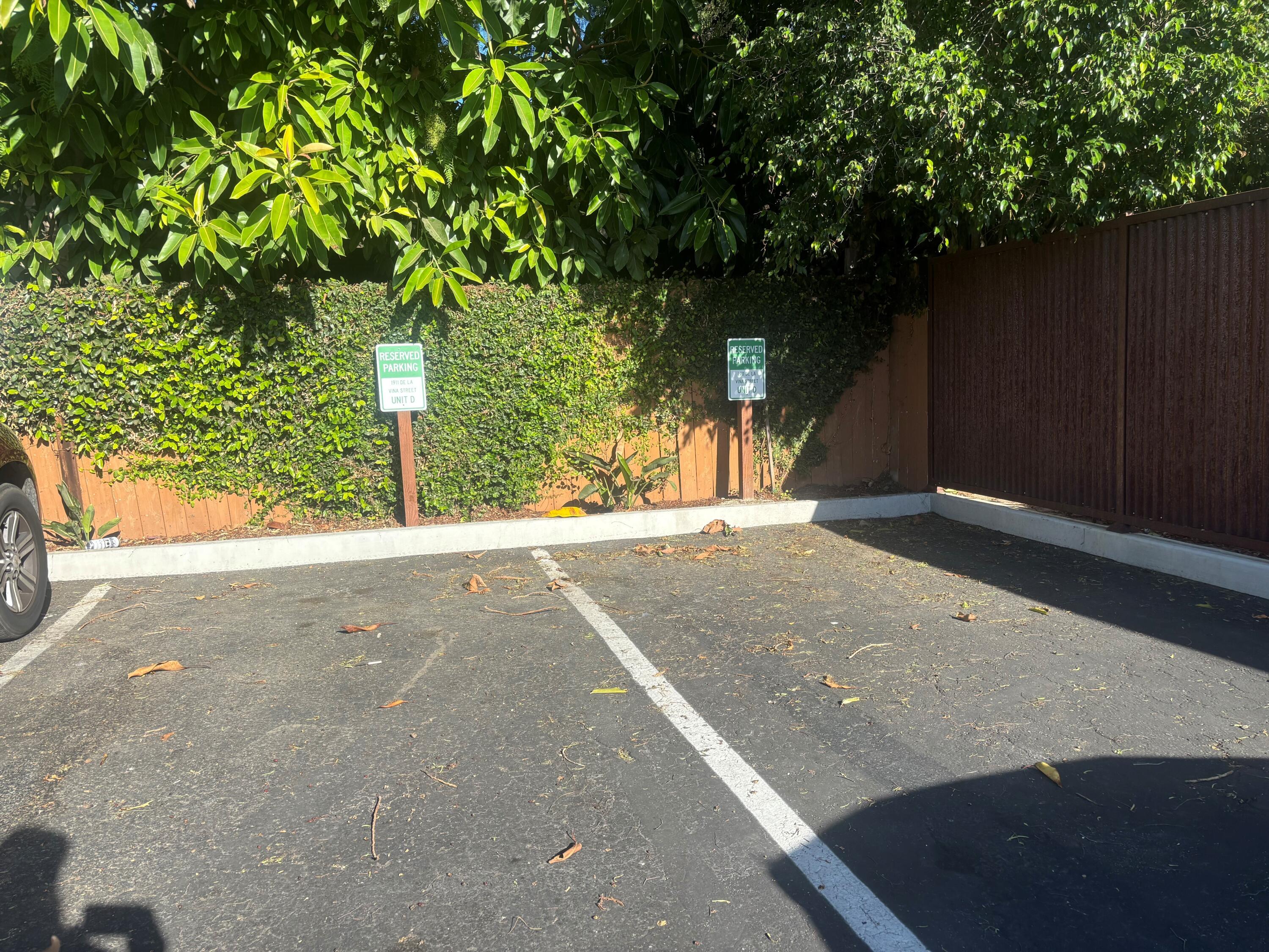 1911 De La Vina Street, Unit D Santa Barbara, CA 93101 - Photo 6 of 6 a view of a yard with yellow plants