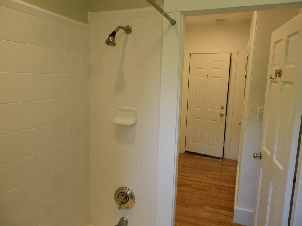 63 Oak Street, Unit B Needham, MA 02492 - Photo 8 of 8 a bathroom with a shower