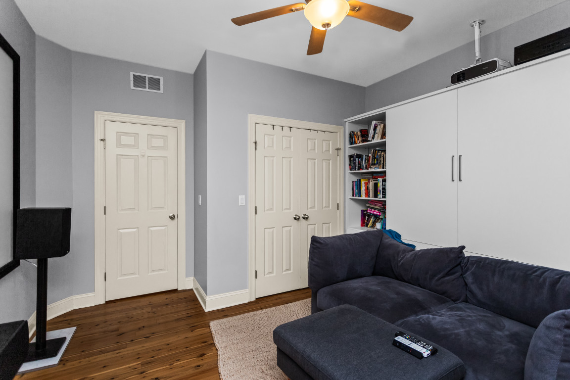 4635 North Malden Street, Unit 3S Chicago, IL 60640 - Photo 13 of 20 a living room with furniture and a lamp