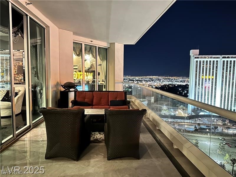 2857 Paradise Road, Unit 2103 Las Vegas, NV 89109 - Photo 40 of 55 View of balcony at twilight