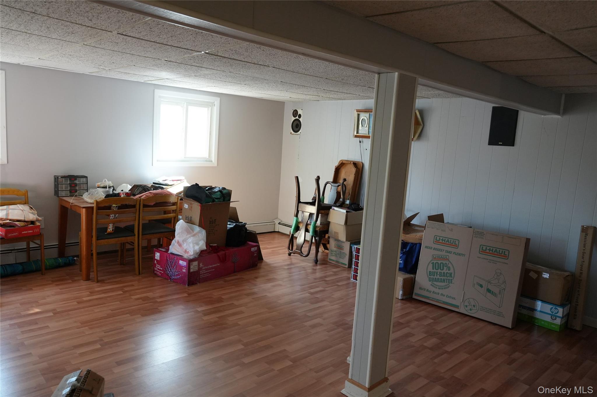 215 Lakeside Trail Ridge, NY 11961 - Photo 15 of 19 a living room with furniture and wooden floor