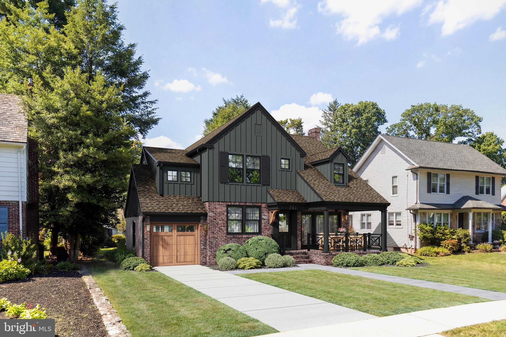741 West Redman Avenue Haddonfield, NJ 08033 - Photo 2 of 5 a front view of a house with a garden