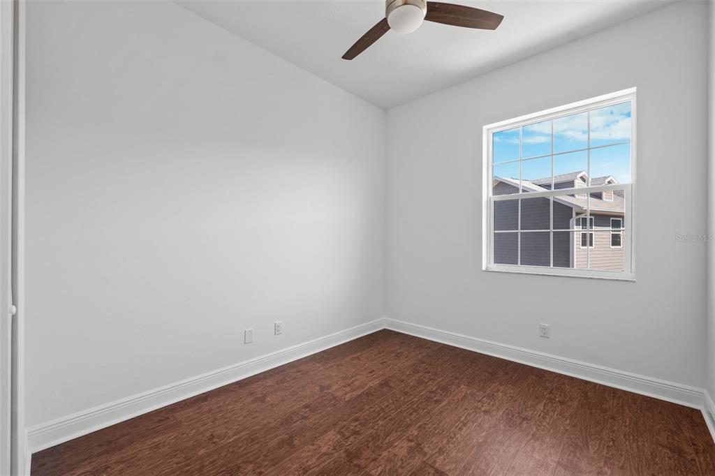 5732 Biscayne Court, Unit 1 New Port Richey, FL 34652 - Photo 22 of 48 an empty room with a window