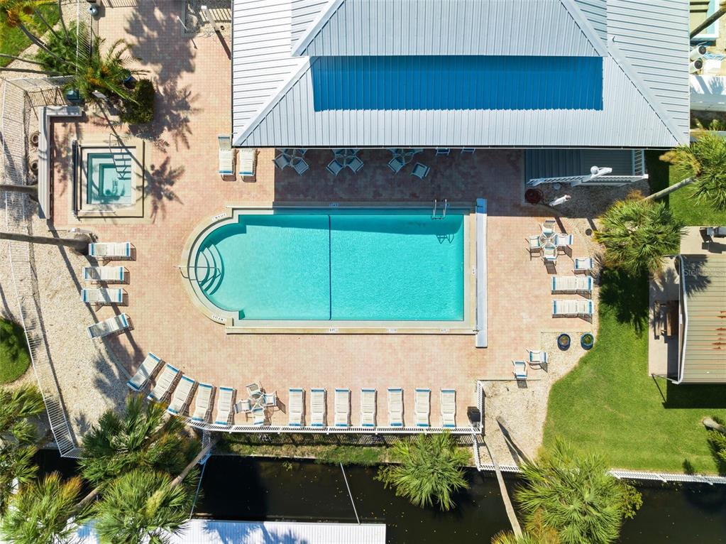 5732 Biscayne Court, Unit 1 New Port Richey, FL 34652 - Photo 36 of 48 an aerial view of a house with swimming pool and patio