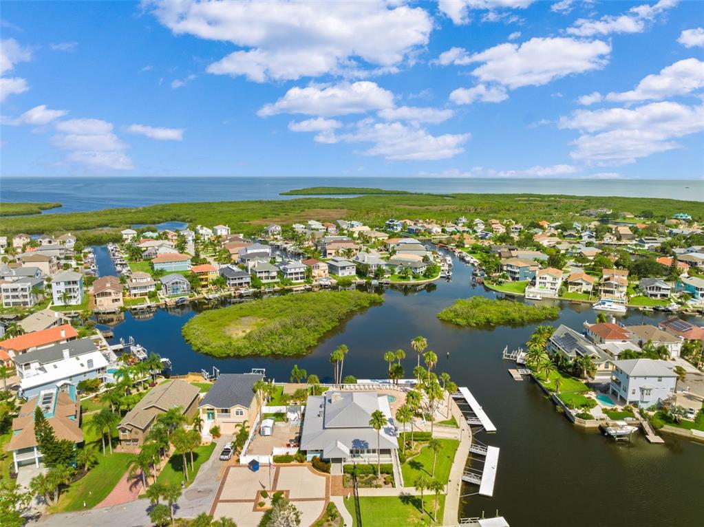 5732 Biscayne Court, Unit 1 New Port Richey, FL 34652 - Photo 40 of 48 a view of a city with an ocean