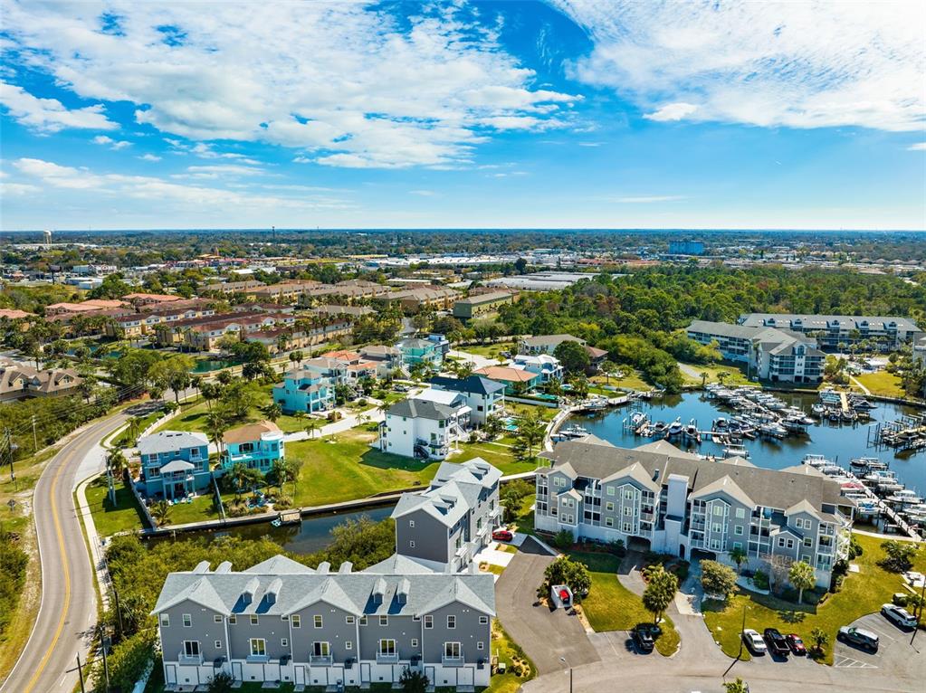 5732 Biscayne Court, Unit 1 New Port Richey, FL 34652 - Photo 44 of 48 an aerial view of residential houses with outdoor space