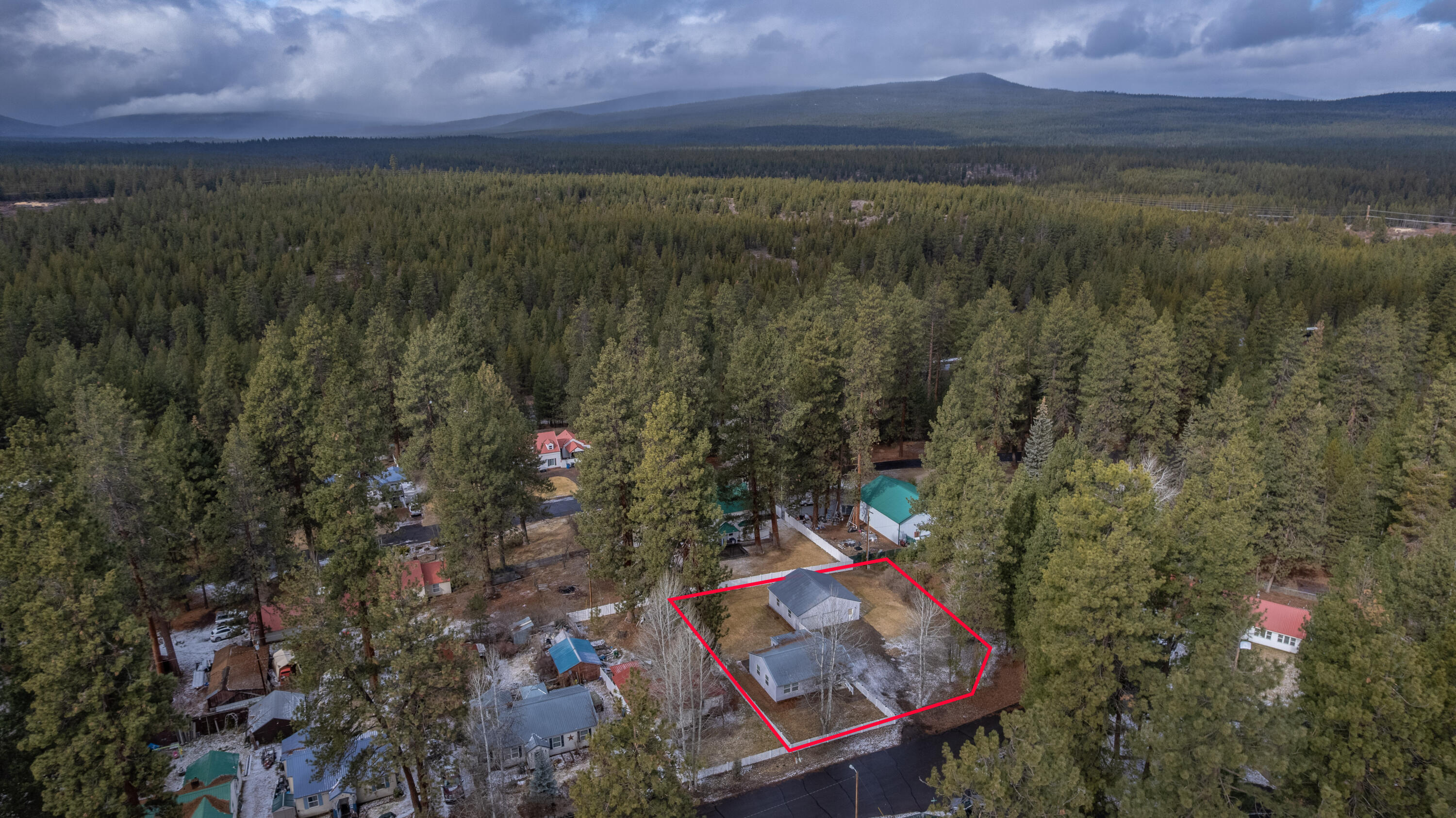 138722 Rhododendron Street Gilchrist, OR 97737 - Photo 10 of 36 a view of a yard with a lake view