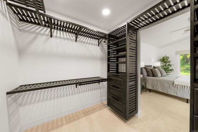 a view of a living room with wooden floor