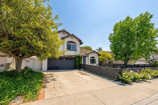 a view of swimming pool with seating space