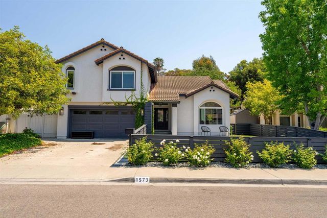 a house view with a garden space