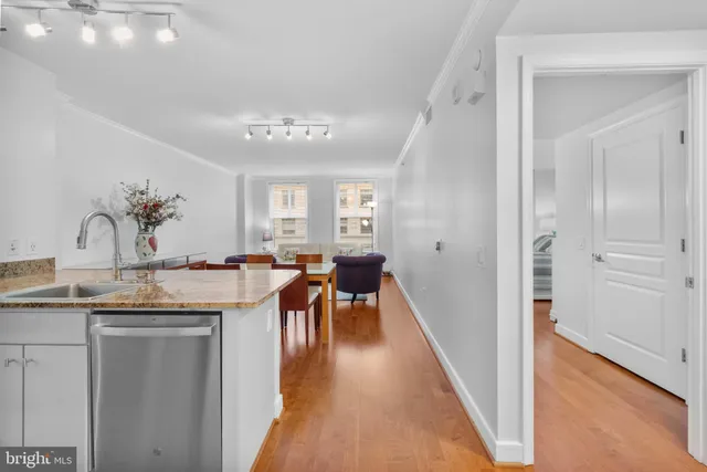 a view of a kitchen from the hallway