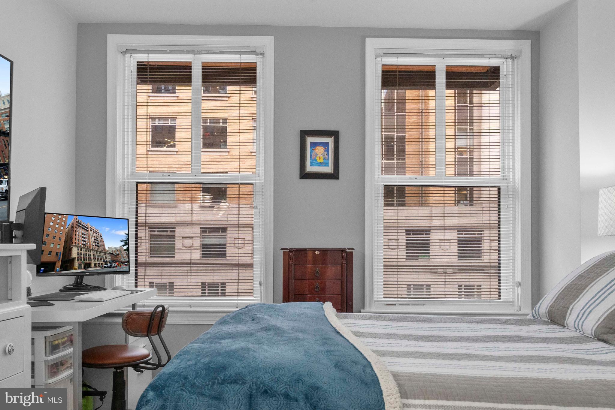 616 E Street Northwest, Unit 522 Washington, DC 20004 - Photo 21 of 43 a living room with furniture