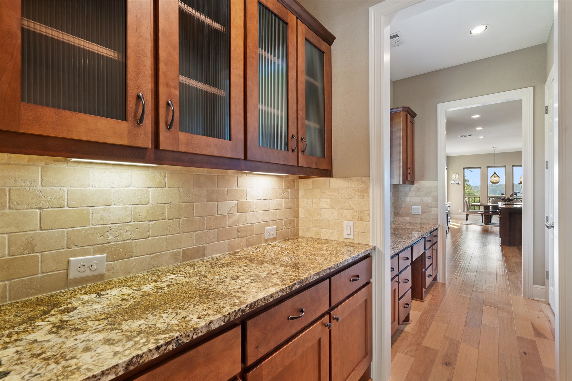 732 SANTALUZ Path Austin, TX 78732 - Photo 15 of 40 a kitchen with granite countertop sink and cabinets